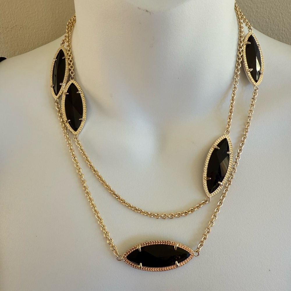 Kendra Scott long gold tone necklace.